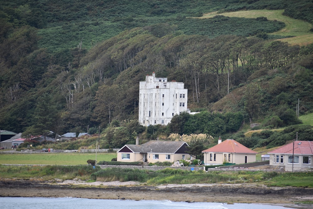 a white building on a hill