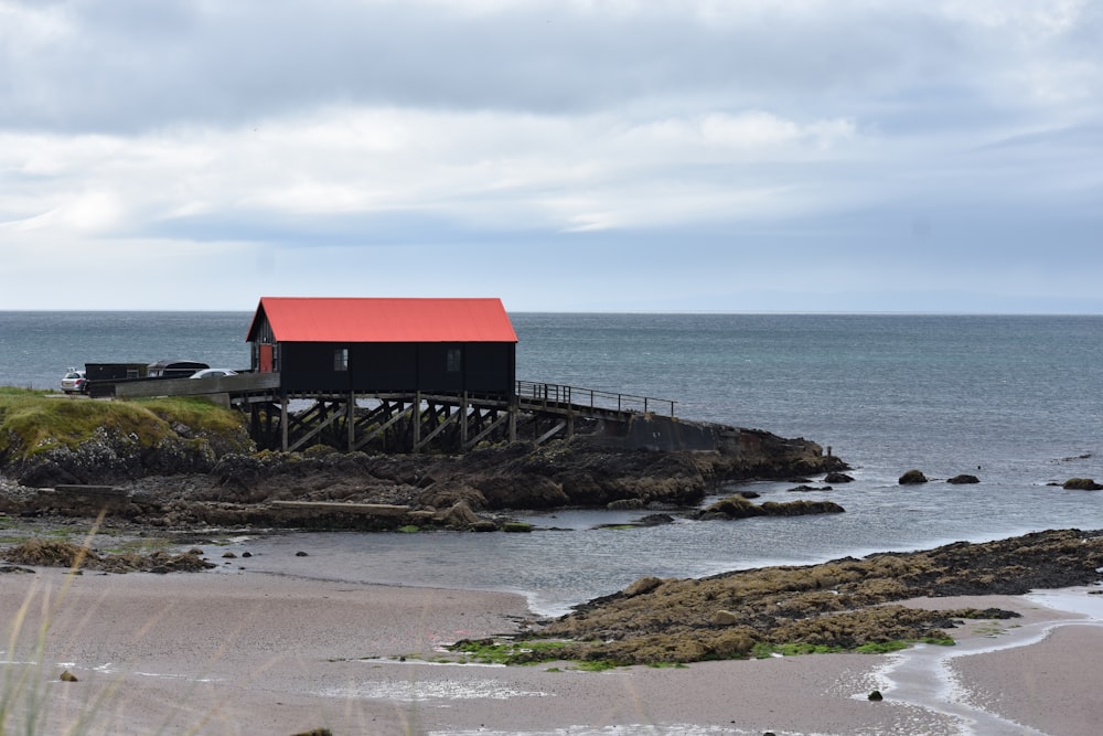 a building on a rocky shore