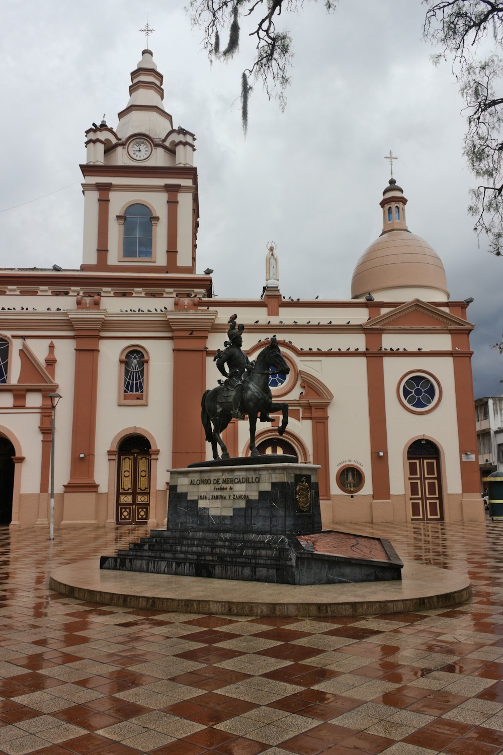 a statue in front of a building