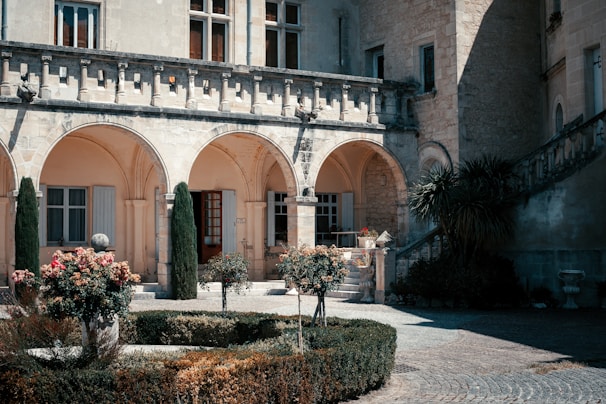a building with a garden in front