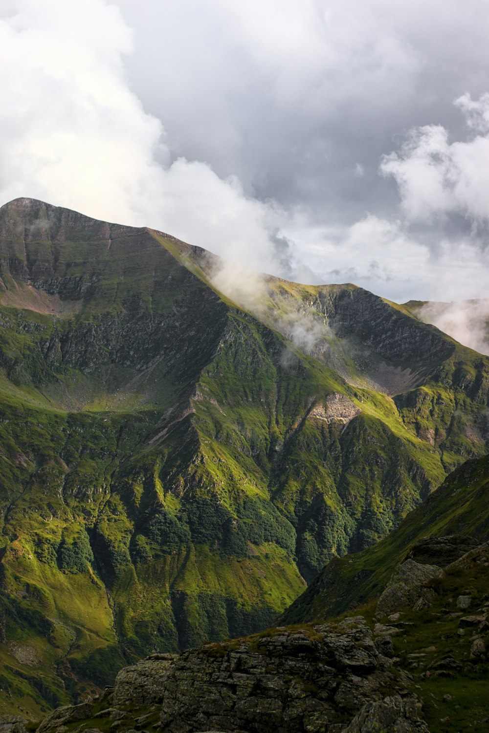 Quiraing with clouds above it