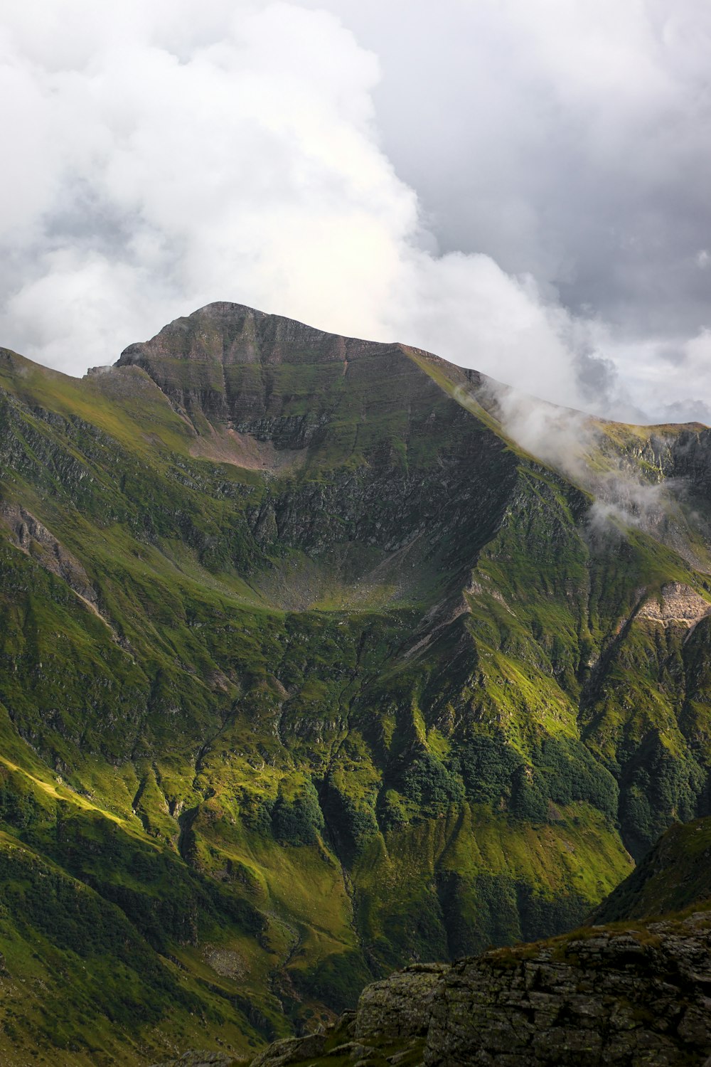 a mountain with a rainbow