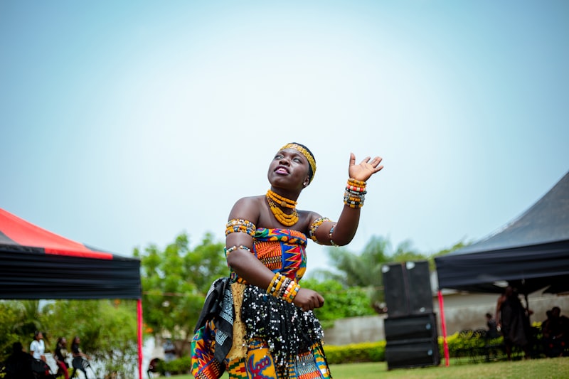 Traditional Ghanaian dancer in cultural attire