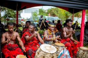 a group of people playing drums