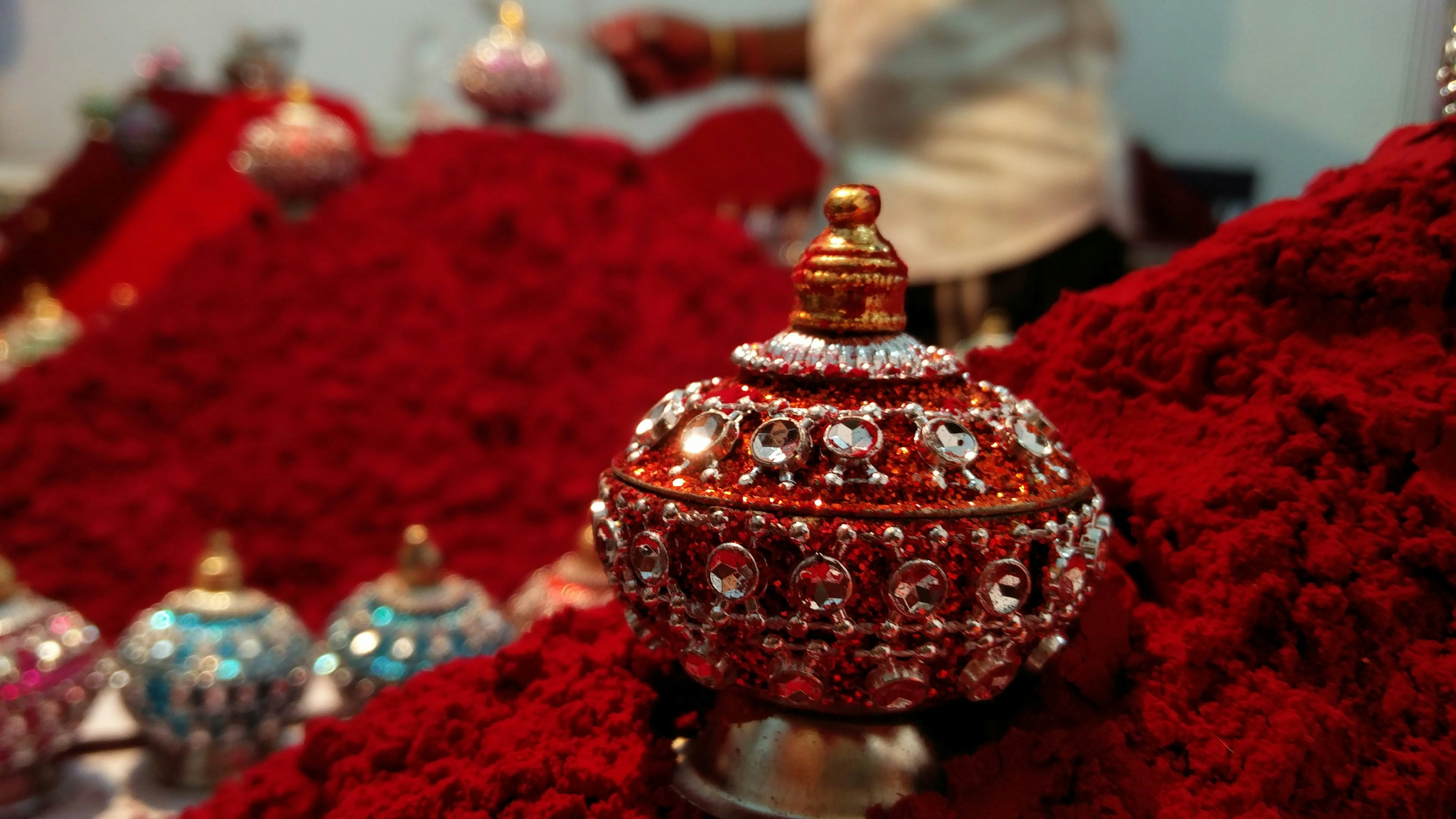 Moroccan aker fassi red powder in ornate brass container