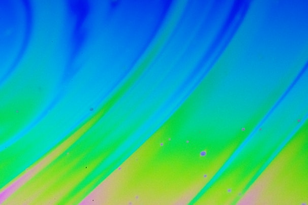 Abstract colorful patterns inspired by psychedelic art, softly blended with calming tones.