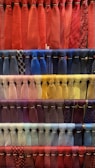 A beautifully arranged display of vibrant ties and pocket squares.