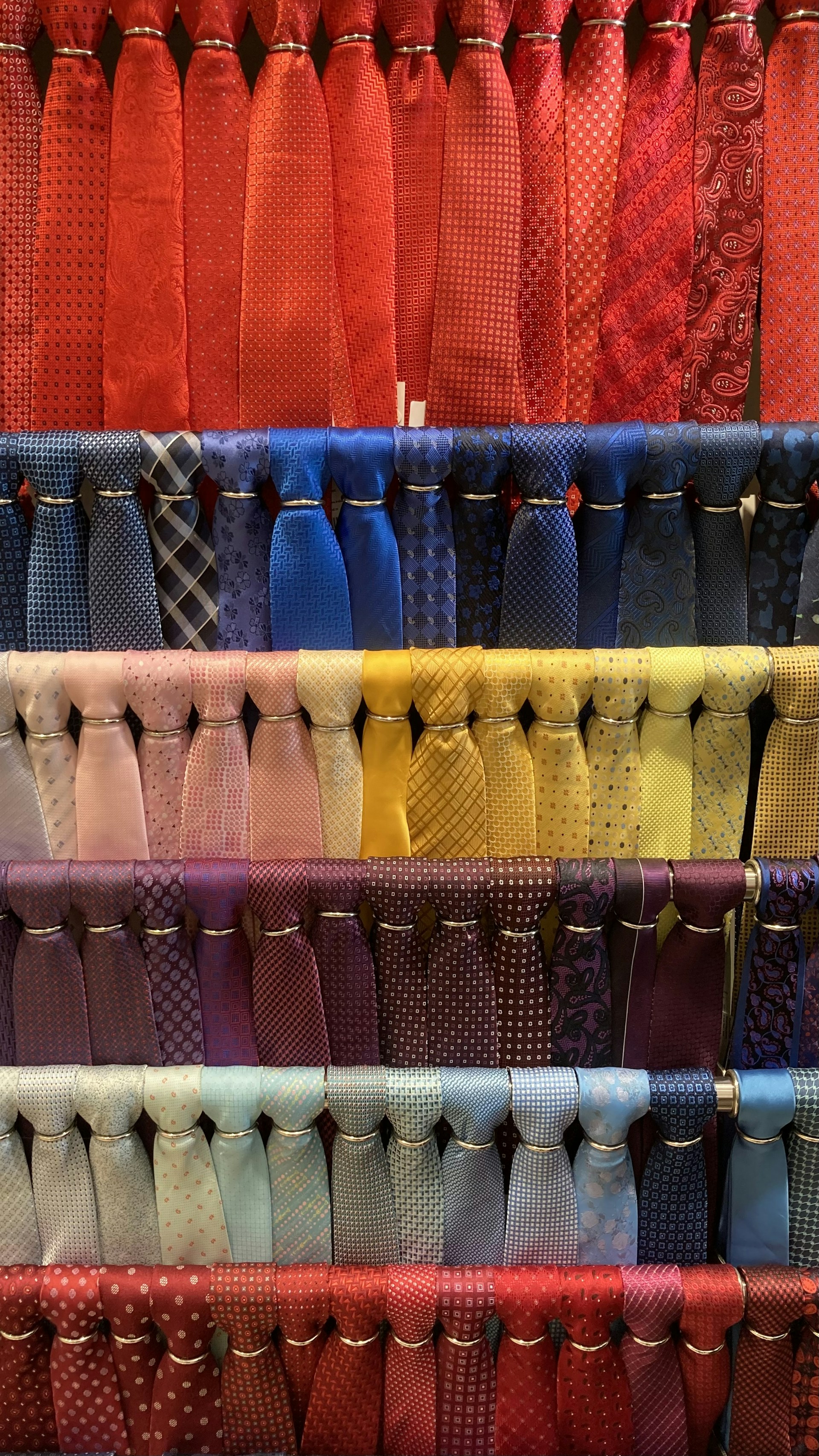 woman wearing yellow long-sleeved dress under white clouds and blue sky during daytime