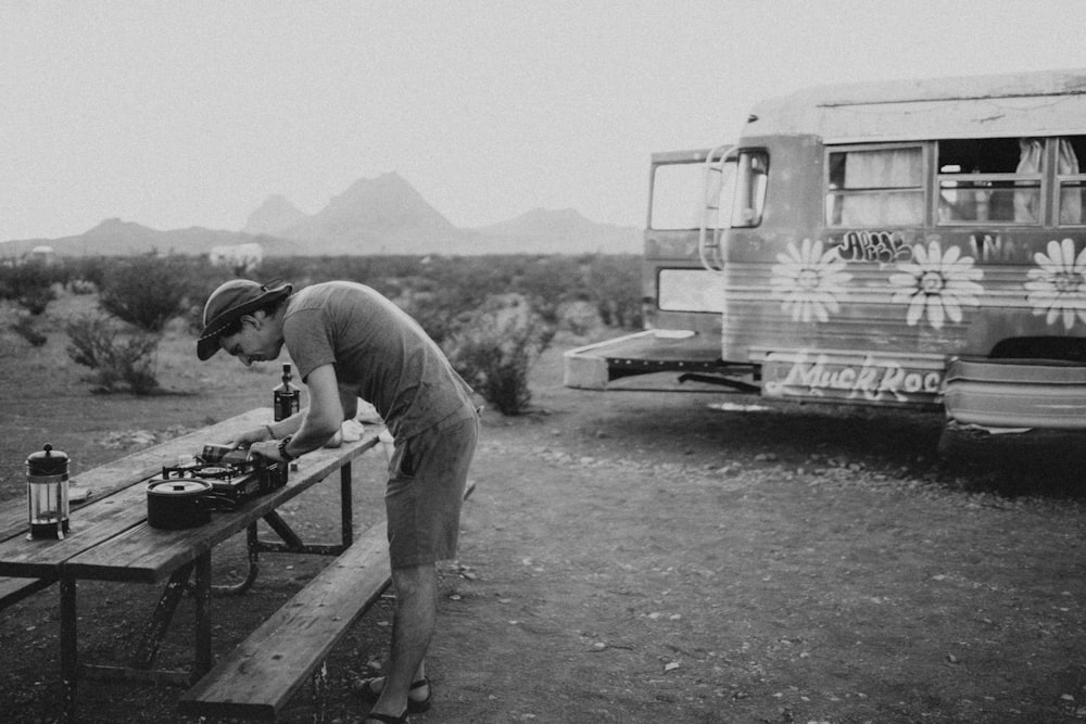 a man cooking outside