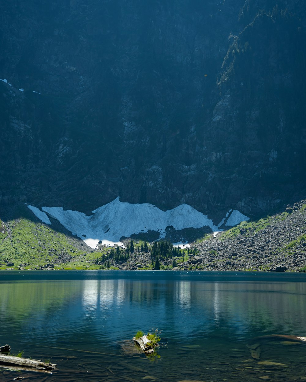 a lake with a mountain in the background