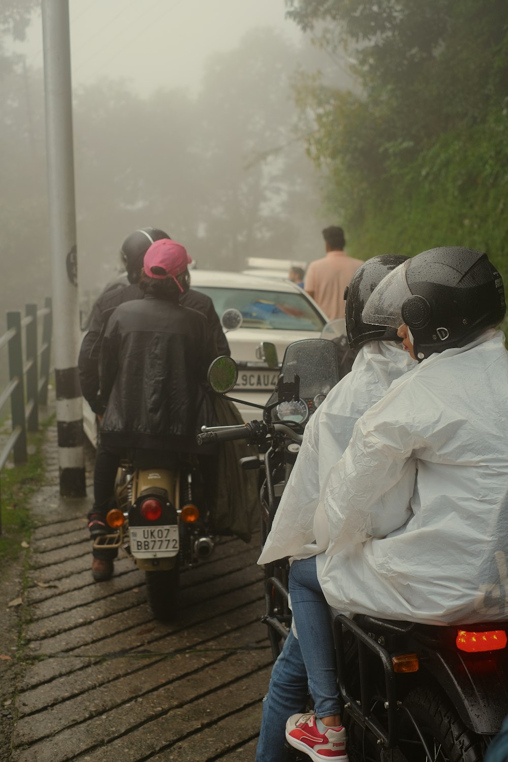 a group of people on motorcycles