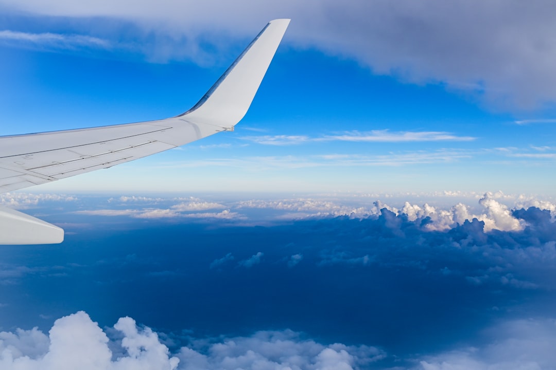 an airplane wing in the sky, Cloudscapes from the Window Seat