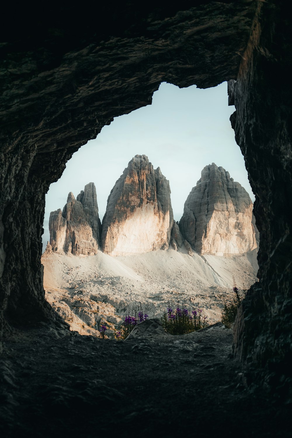 a view of a cave with a group of people inside