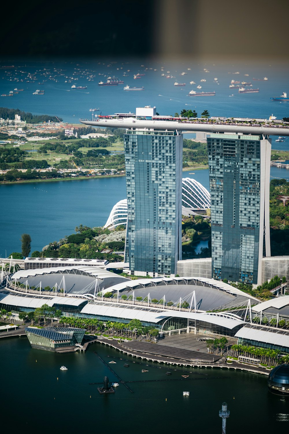 a group of buildings next to a body of water