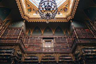 a large ornate ceiling with a stained glass window