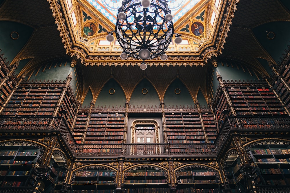 a large ornate ceiling with a stained glass window