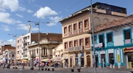 Historic architecture and bustling markets in Santa Marta under bright daylight
