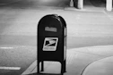 a parking meter on the sidewalk