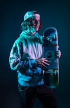 A skater cat mascot holding a skateboard, smiling and ready to help customers.