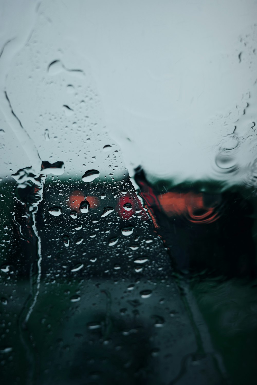 a window with raindrops on it