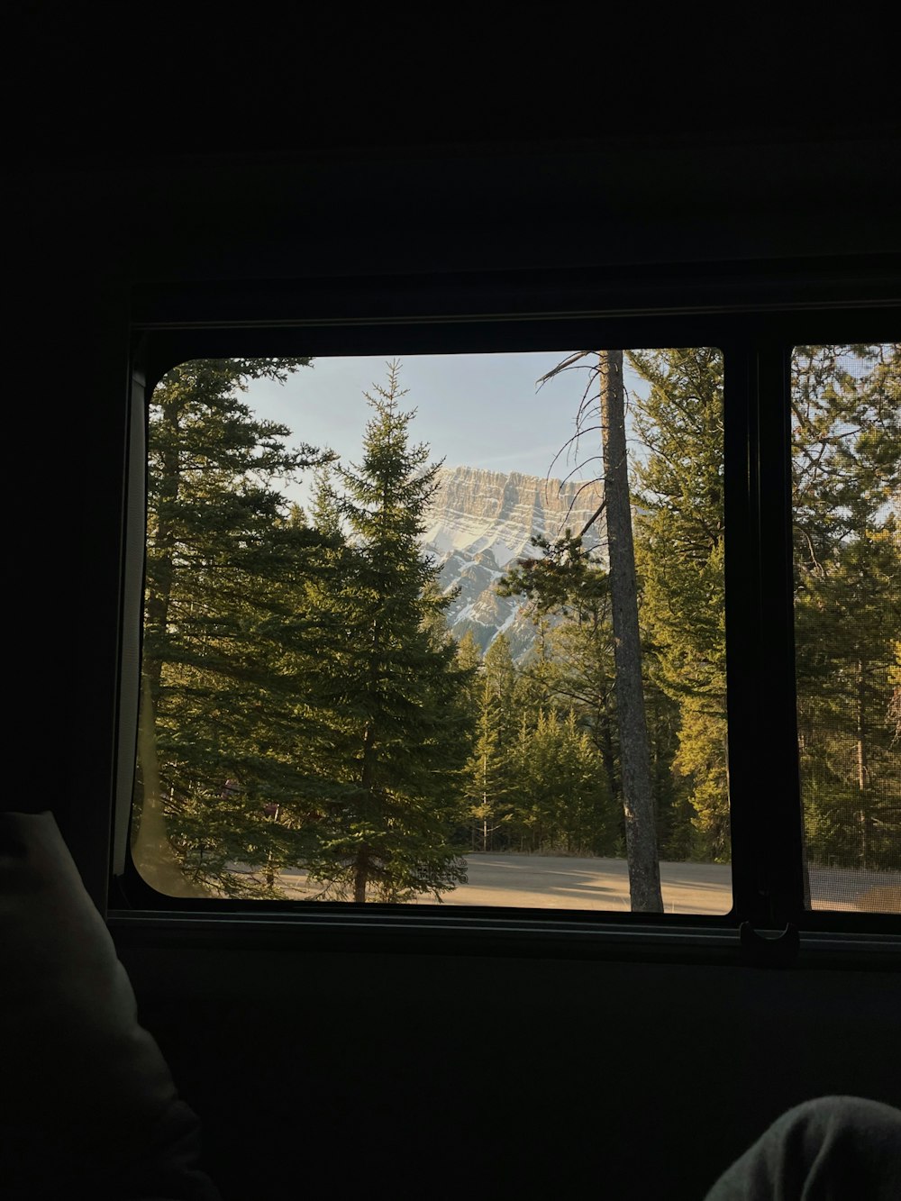 a view of a mountain through a window