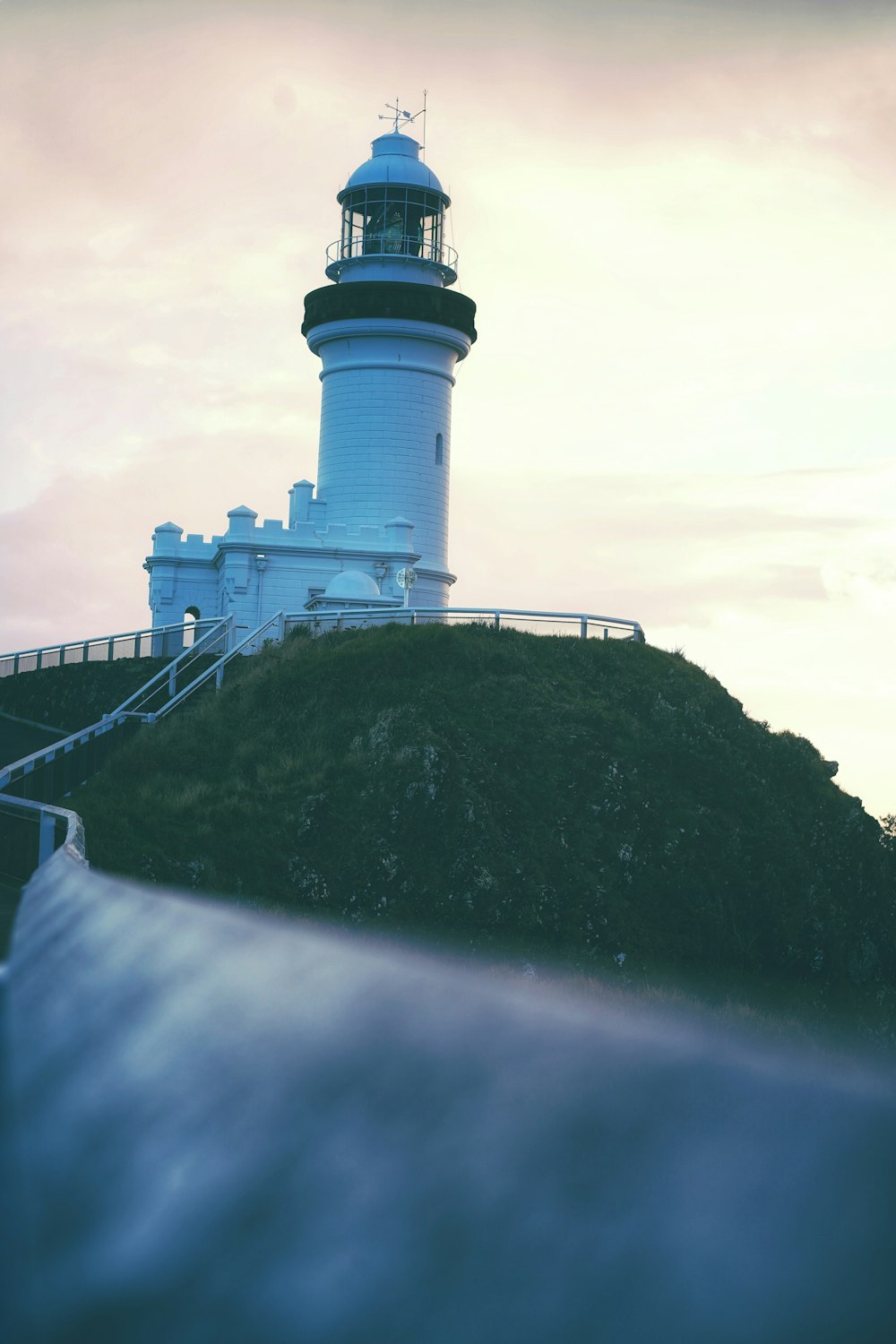 a lighthouse on a hill