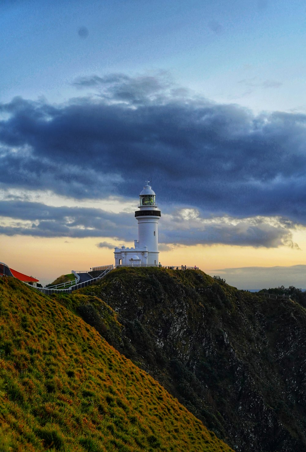 a lighthouse on a hill