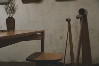 a table and a bench in a room