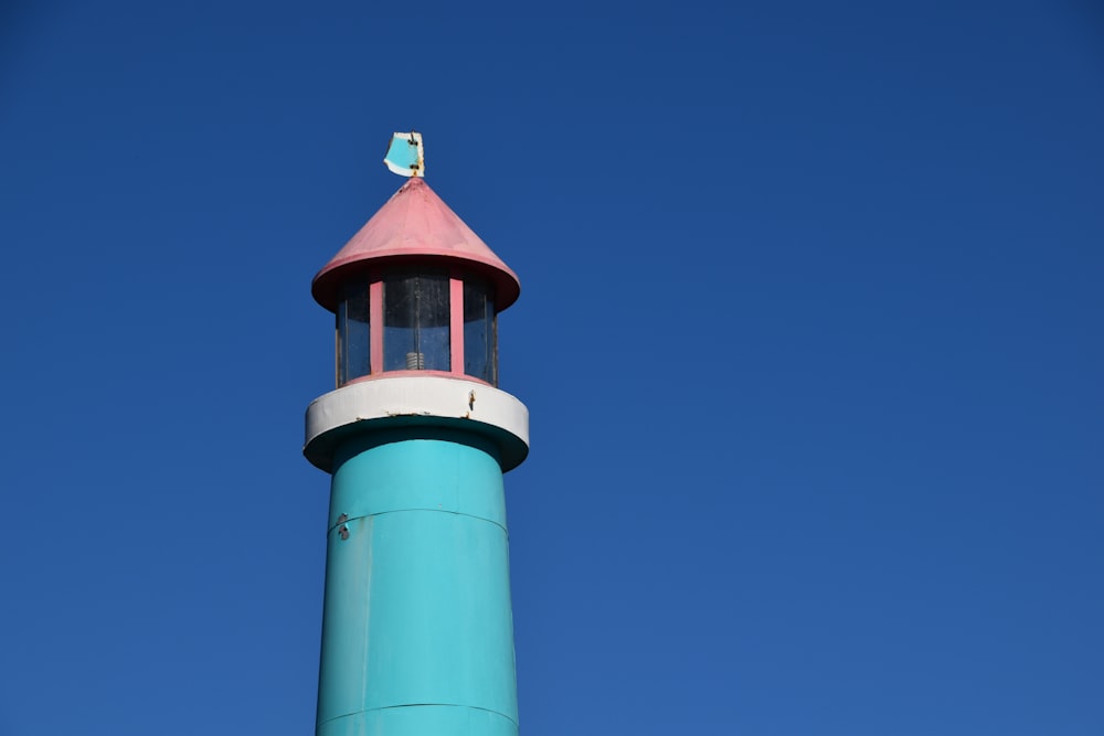 a light house with a blue sky