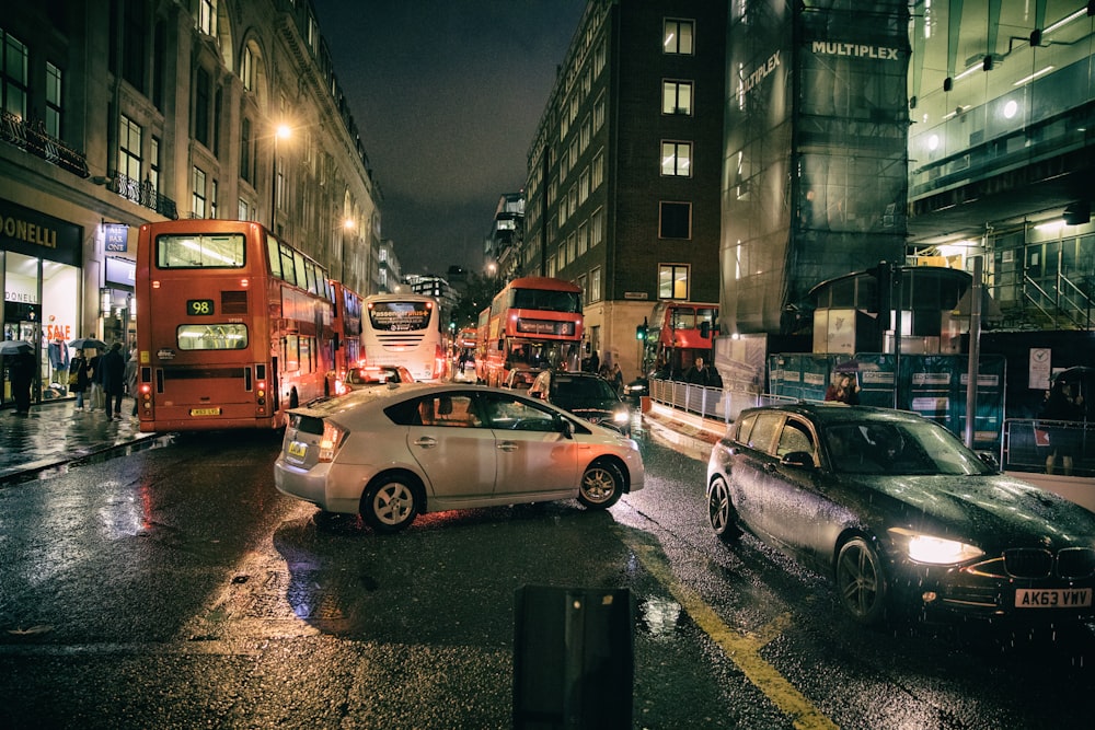 a busy city street at night