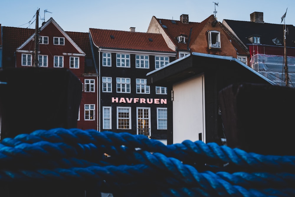 a building with a blue tarp in front of it