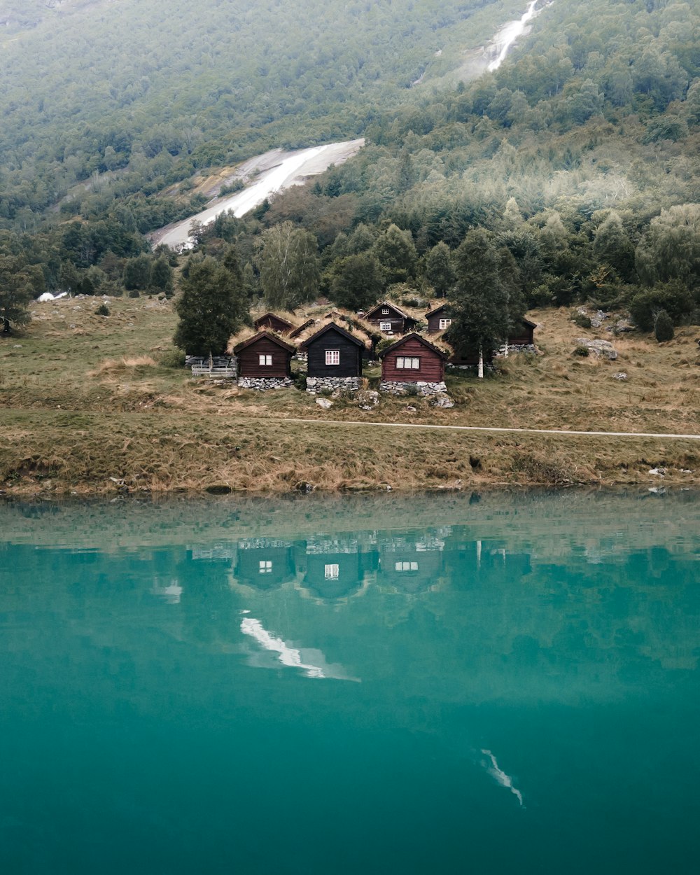 a small town next to a lake