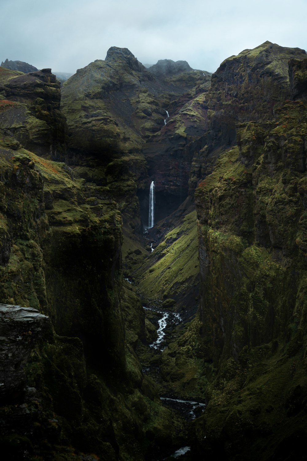 a waterfall in a rocky area