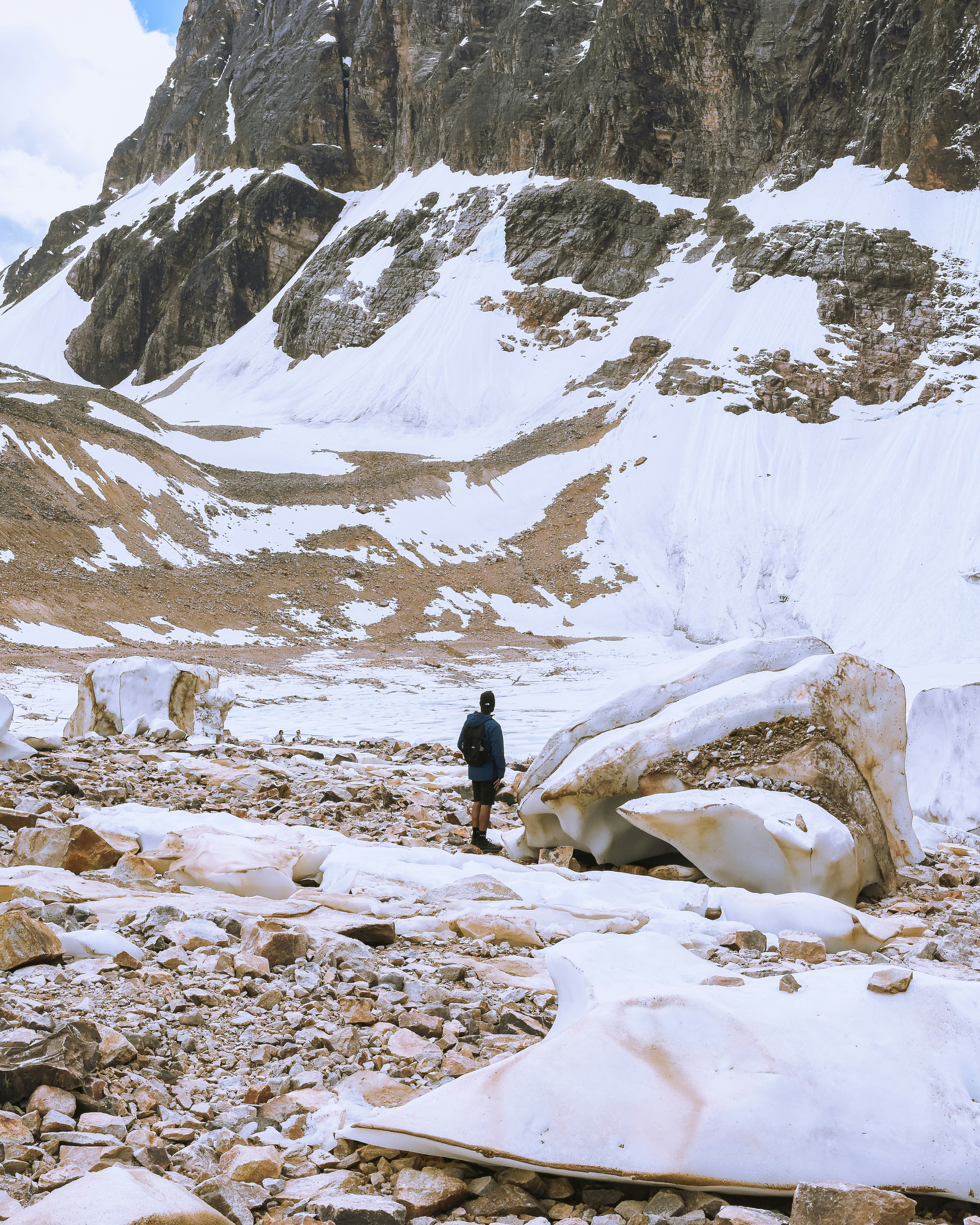 a person standing on a snowy mountain