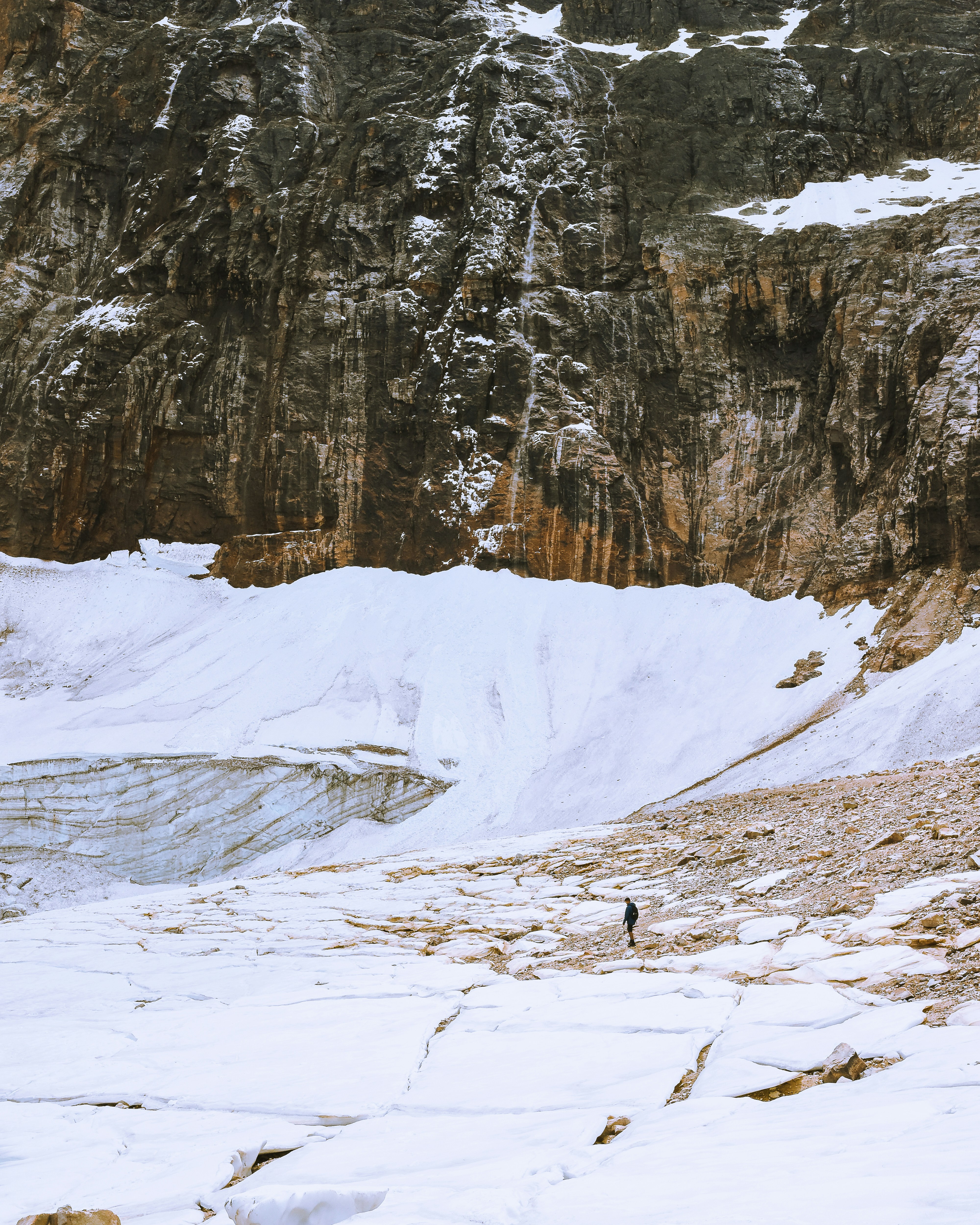 a person walking on a snowy path