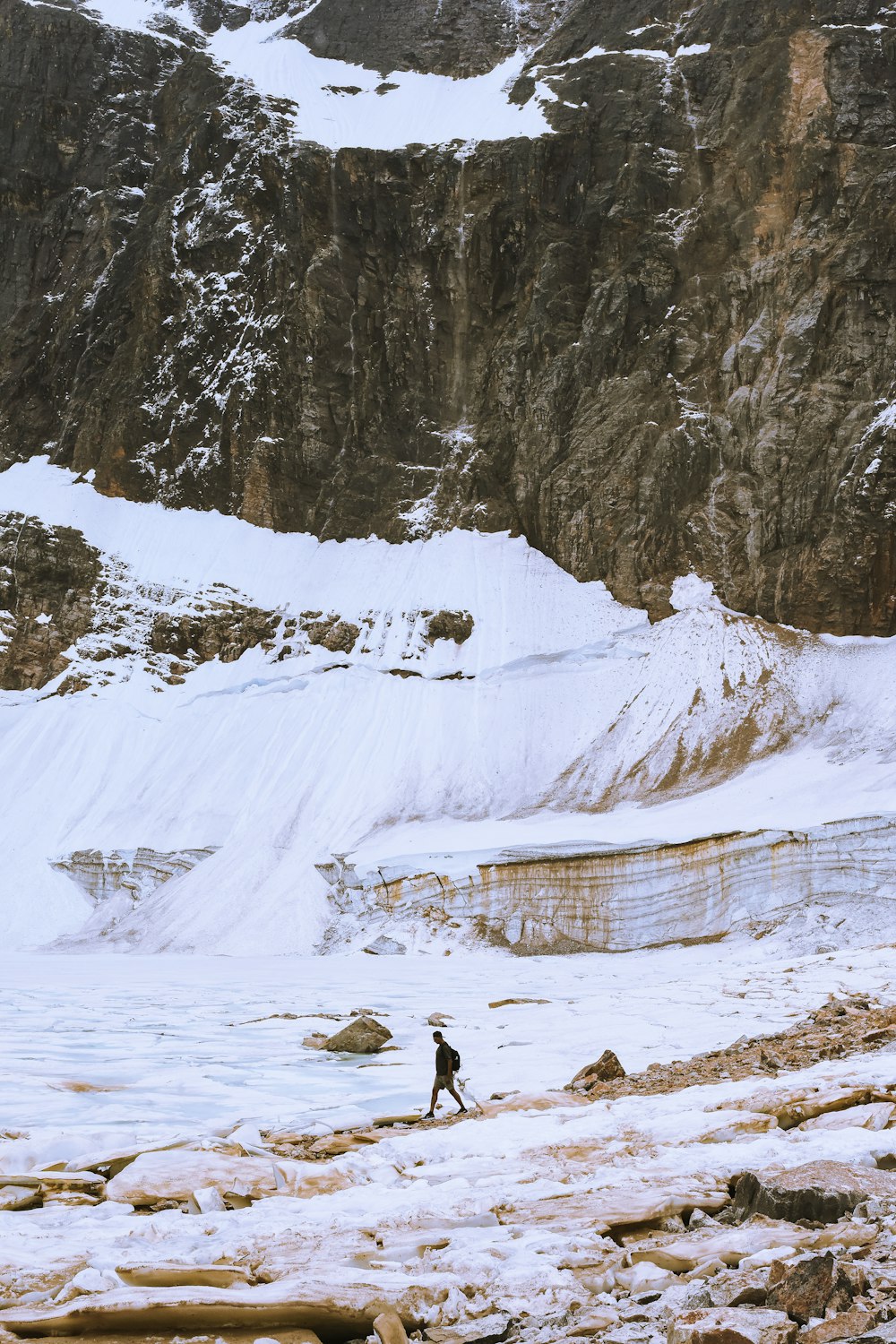 a person walking on a snowy path