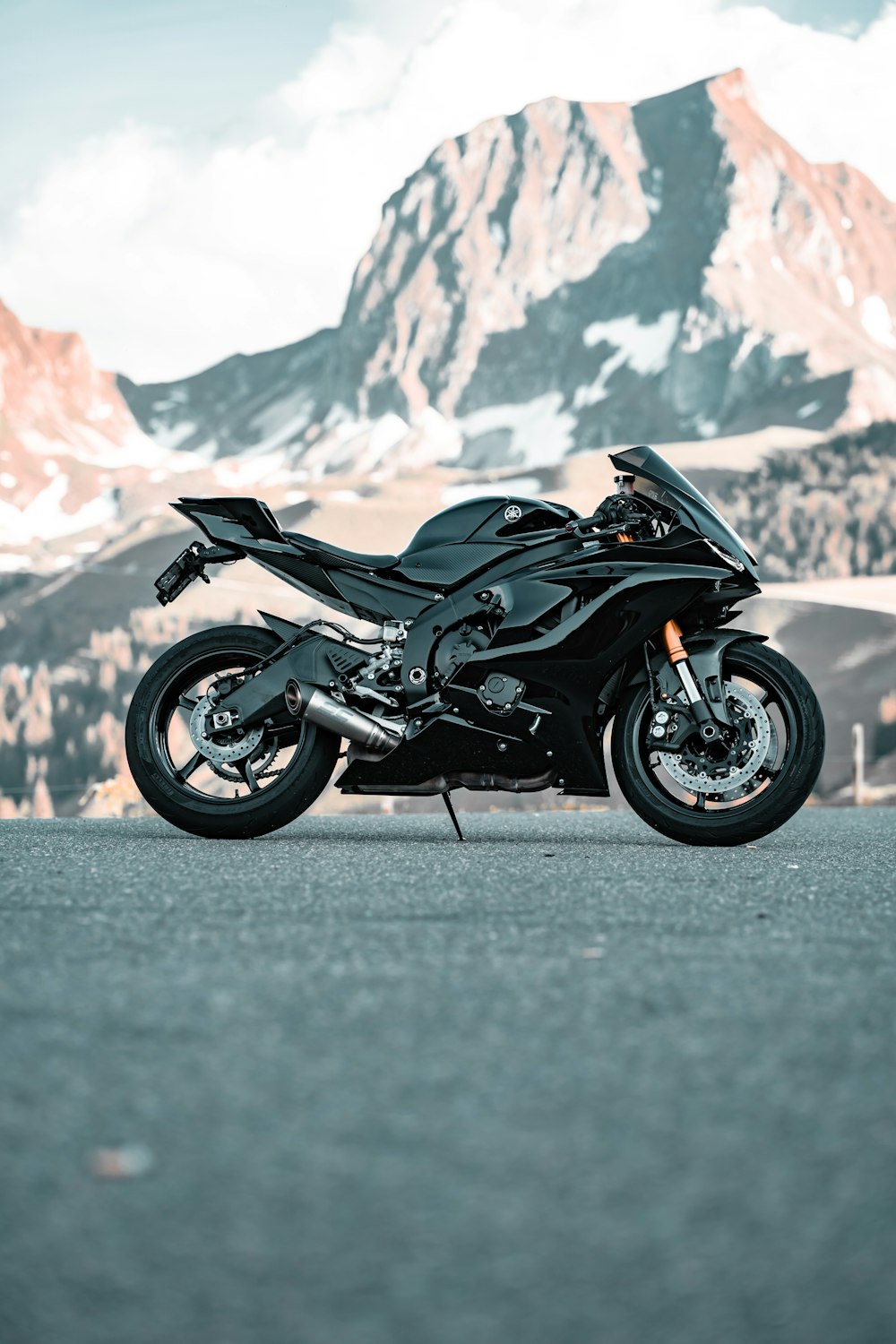 a motorcycle parked on a road