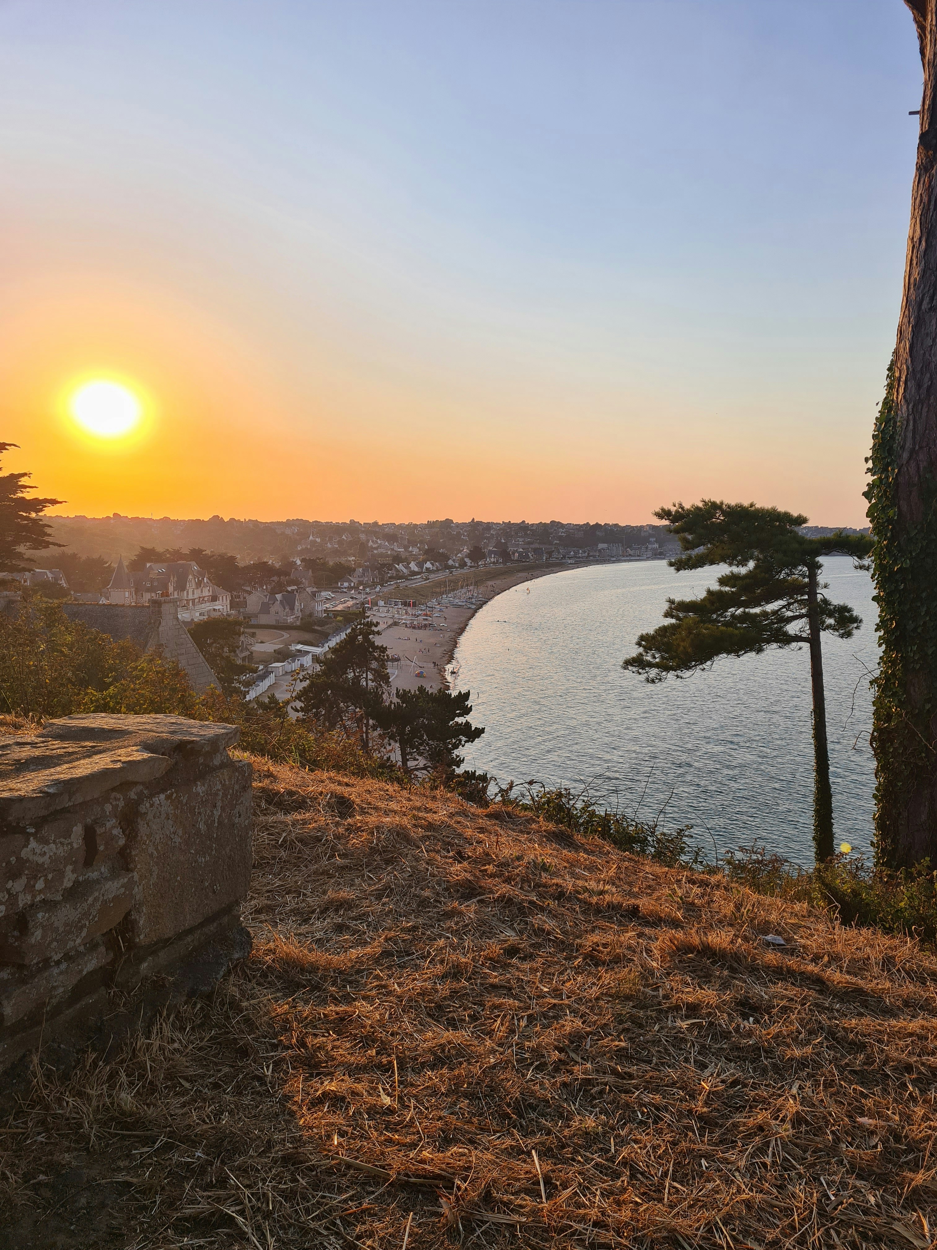 a river with a sunset