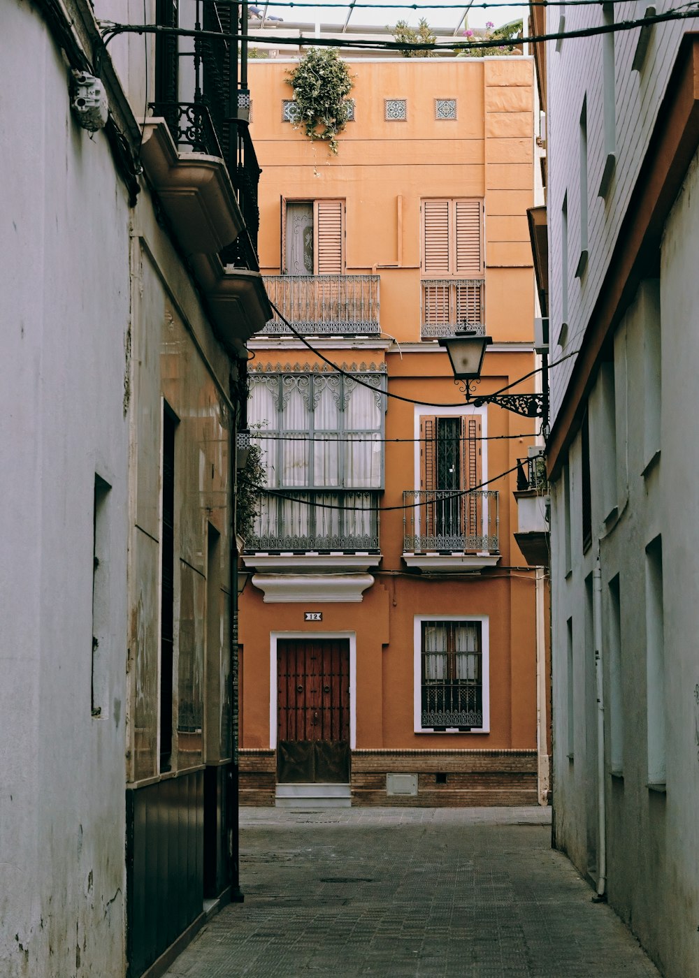 a narrow alley between two buildings