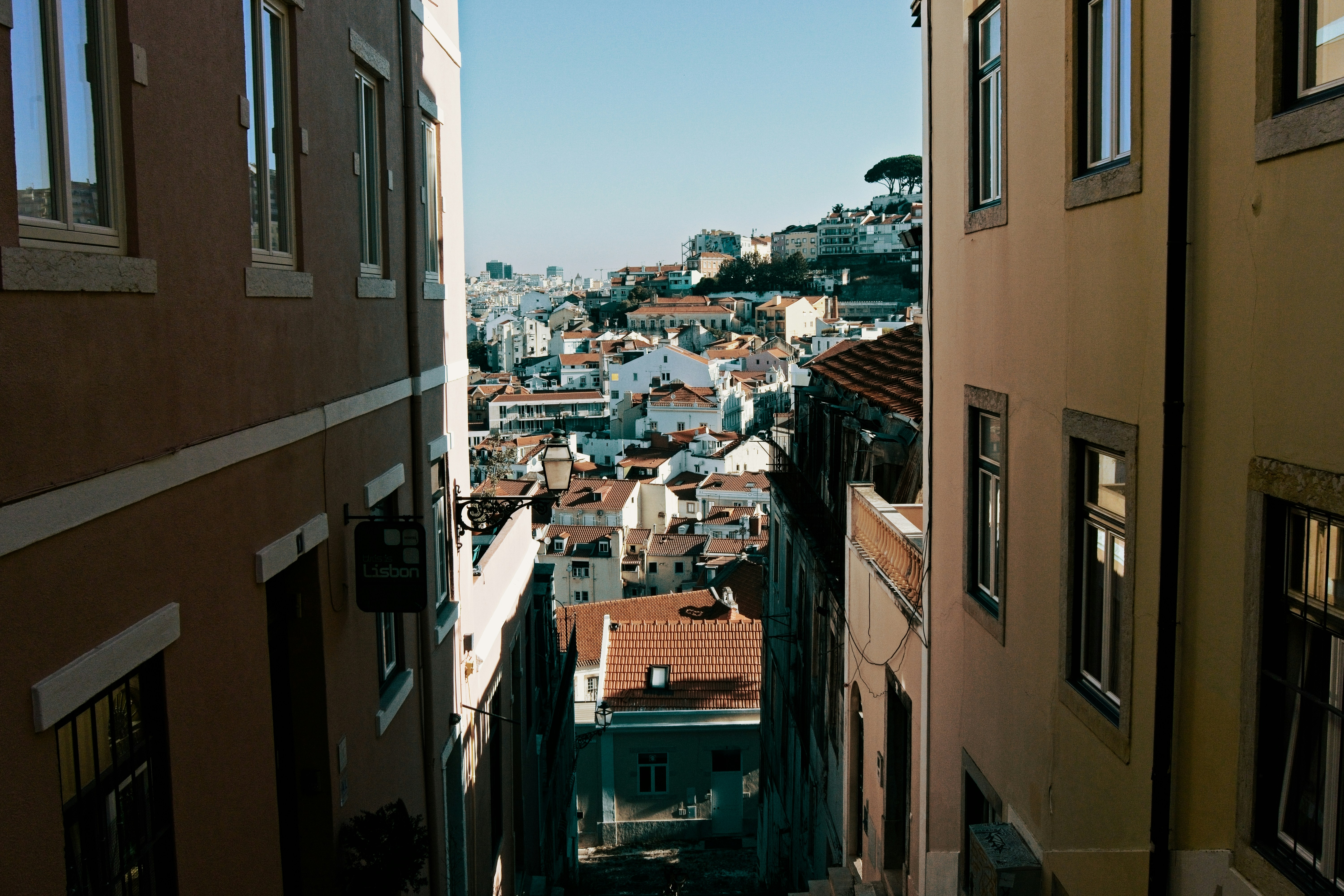a view of a city from a high rise building, 