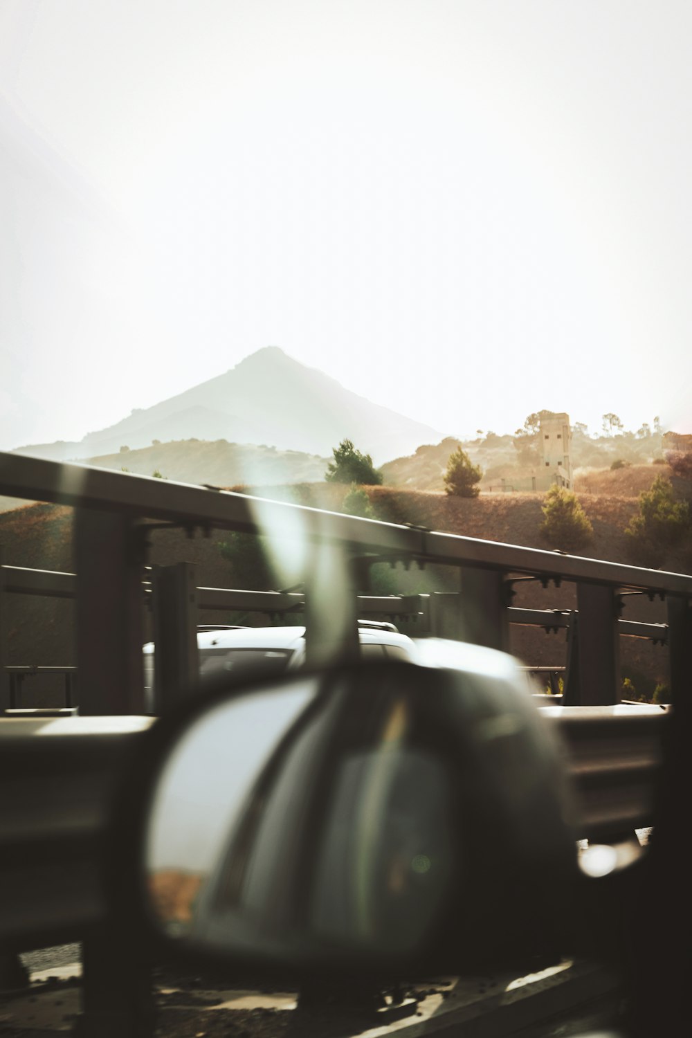 a view of a mountain from a train window