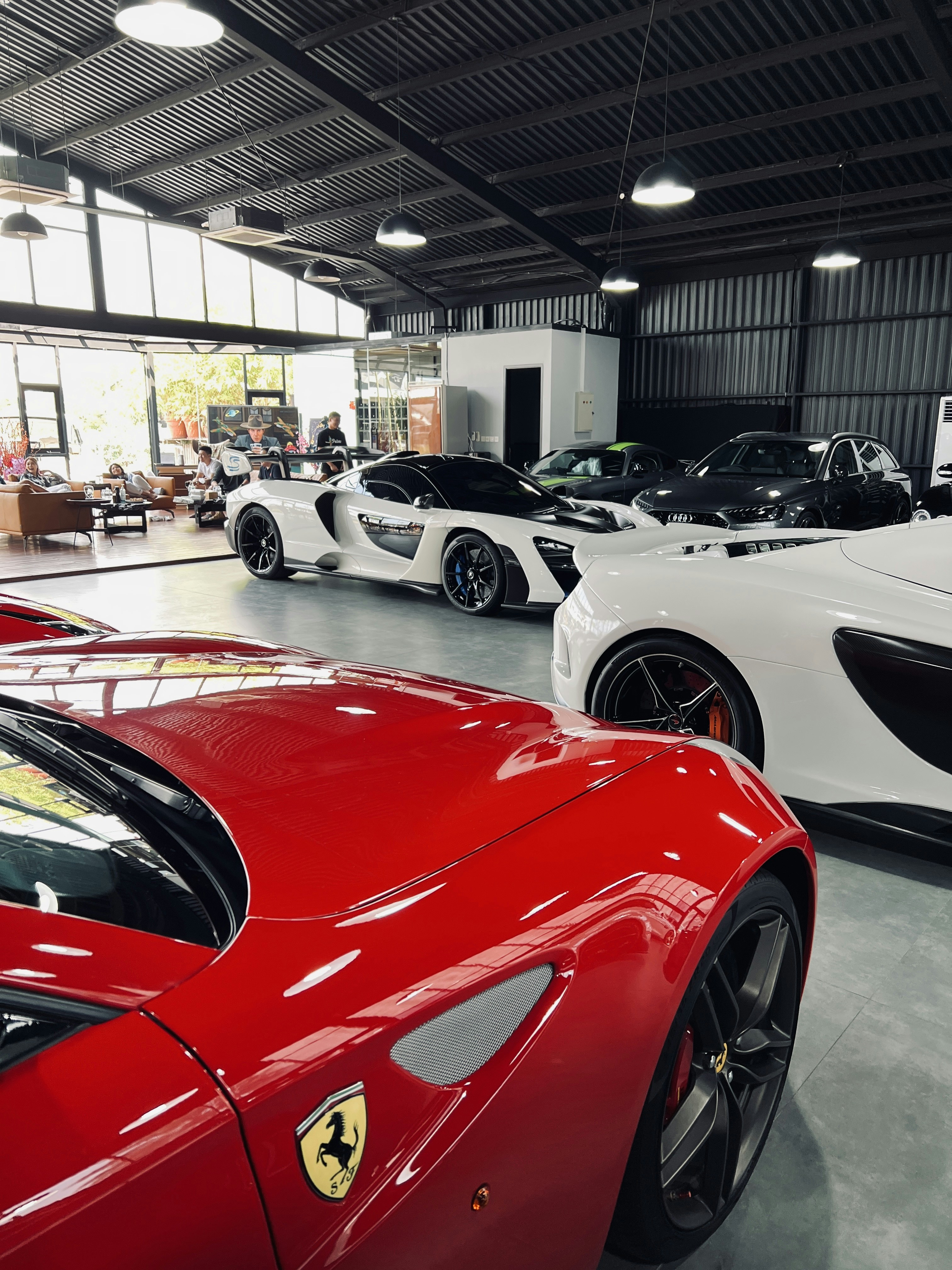 a group of cars parked in a building