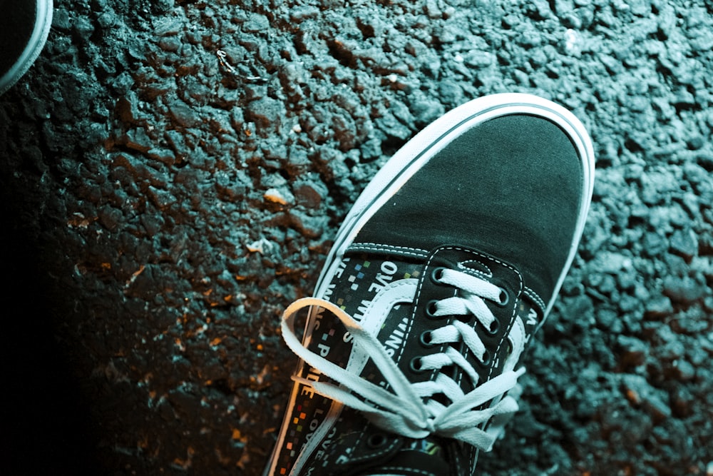 a pair of sneakers on a rock