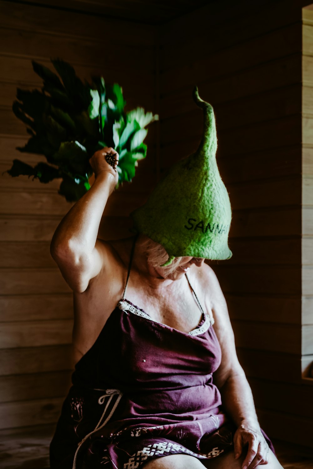 a person holding a plant
