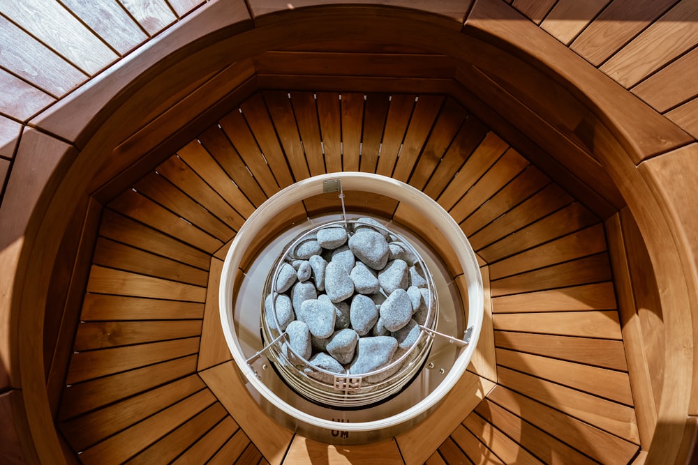 a round metal object with a round metal object on it