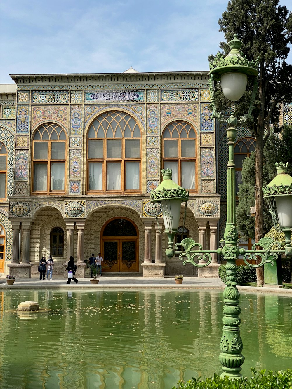 a building with a fountain in front