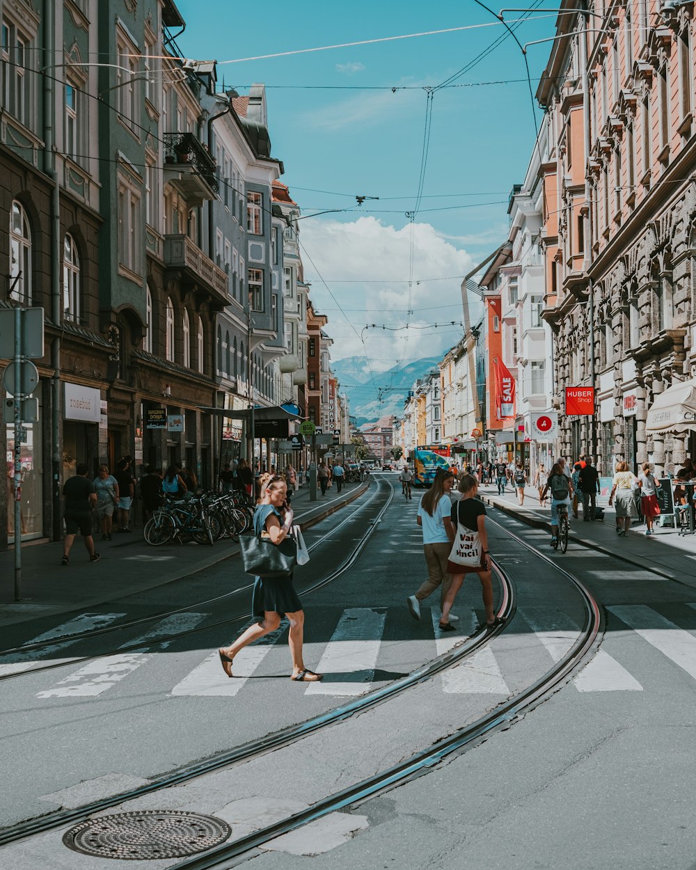 people crossing a street