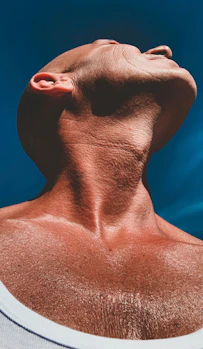 a man's head with a blue background