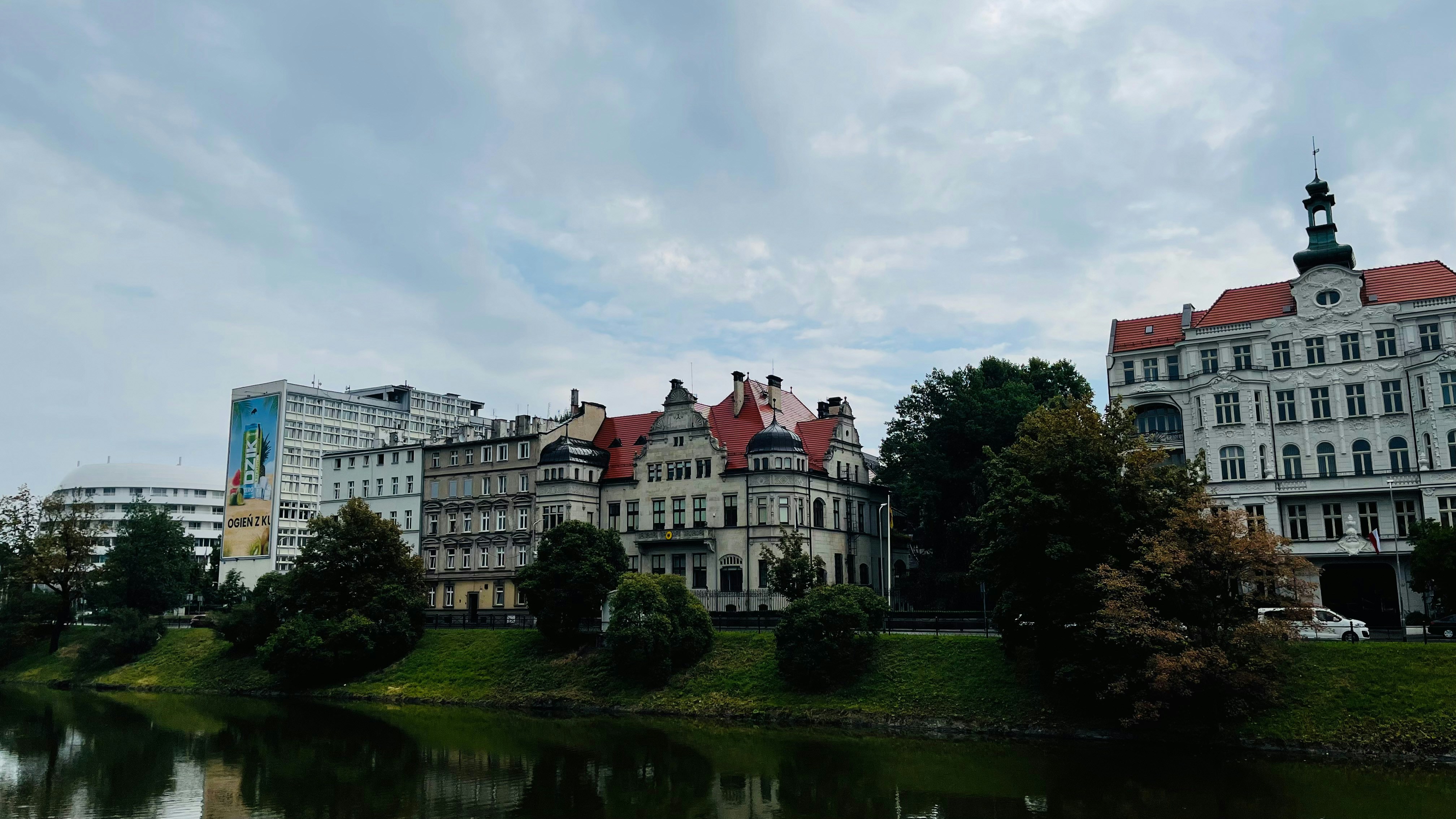 a body of water with buildings around it