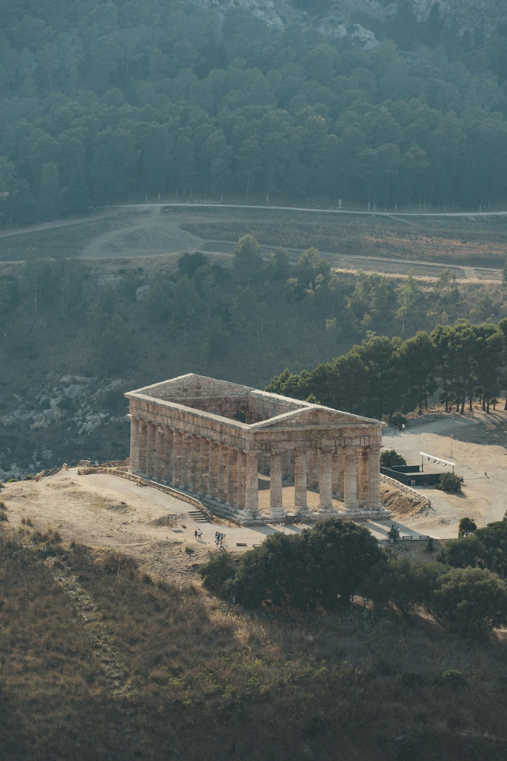 a stone building on a hill